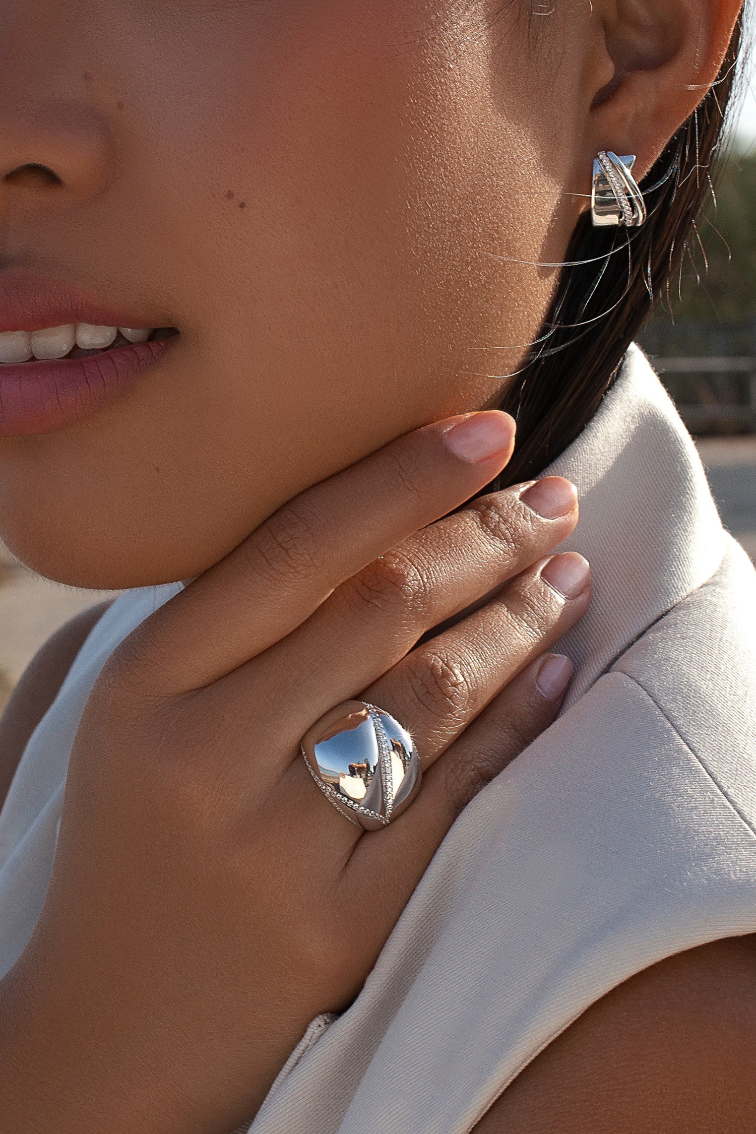 Quilted style silver ring with cubic zirconia and polished finish