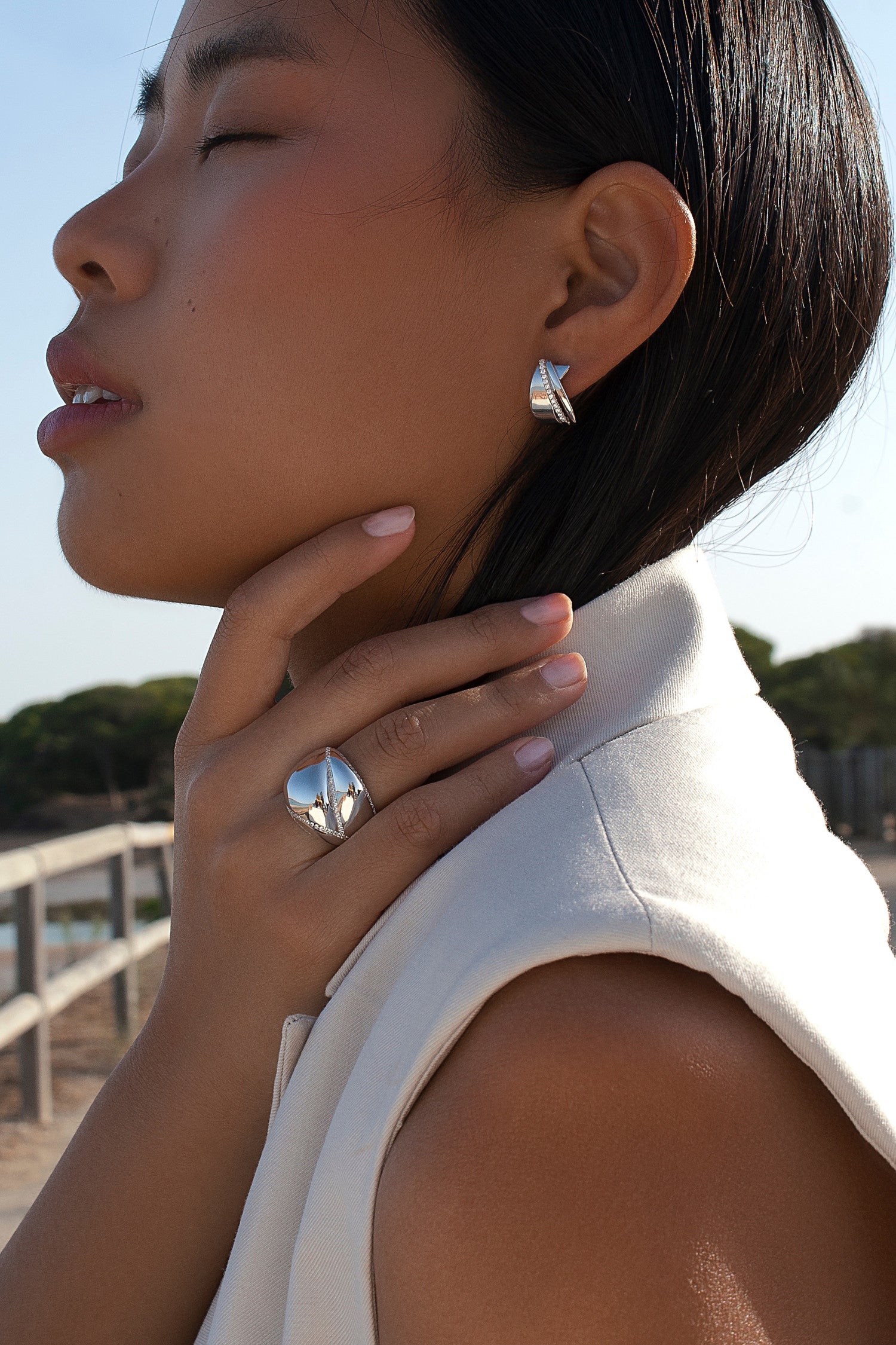 Quilted style silver ring with cubic zirconia and polished finish