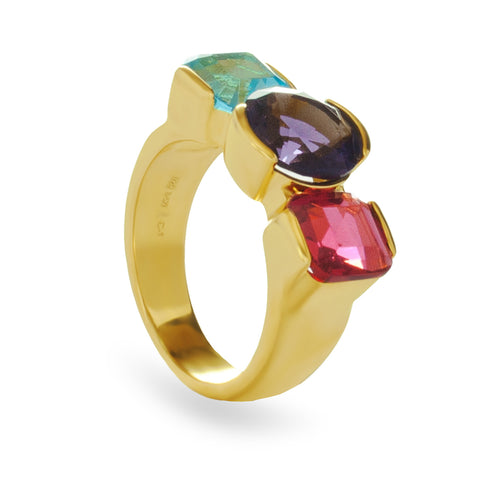 Anillo de plata bañado en oro con piedras turquesa violeta y fucsia