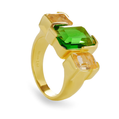Anillo de plata bañado en oro con piedras verde esmeralda y champagne
