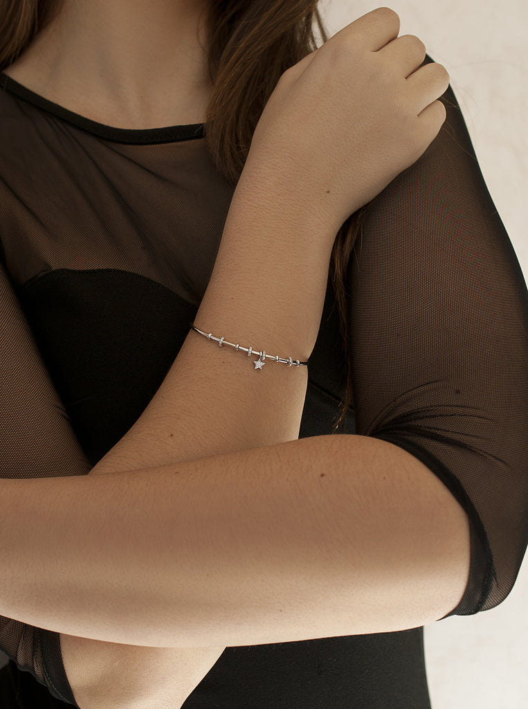Pulsera rígida de plata con estrella y circonitas