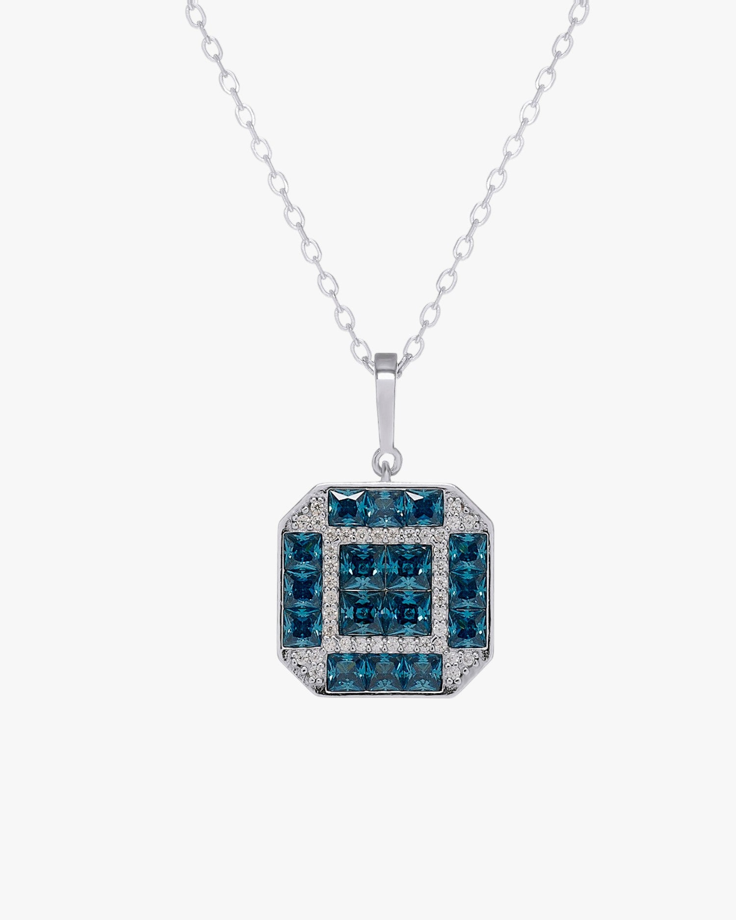 Colgante de plata con piedras azules geométricas y circonitas