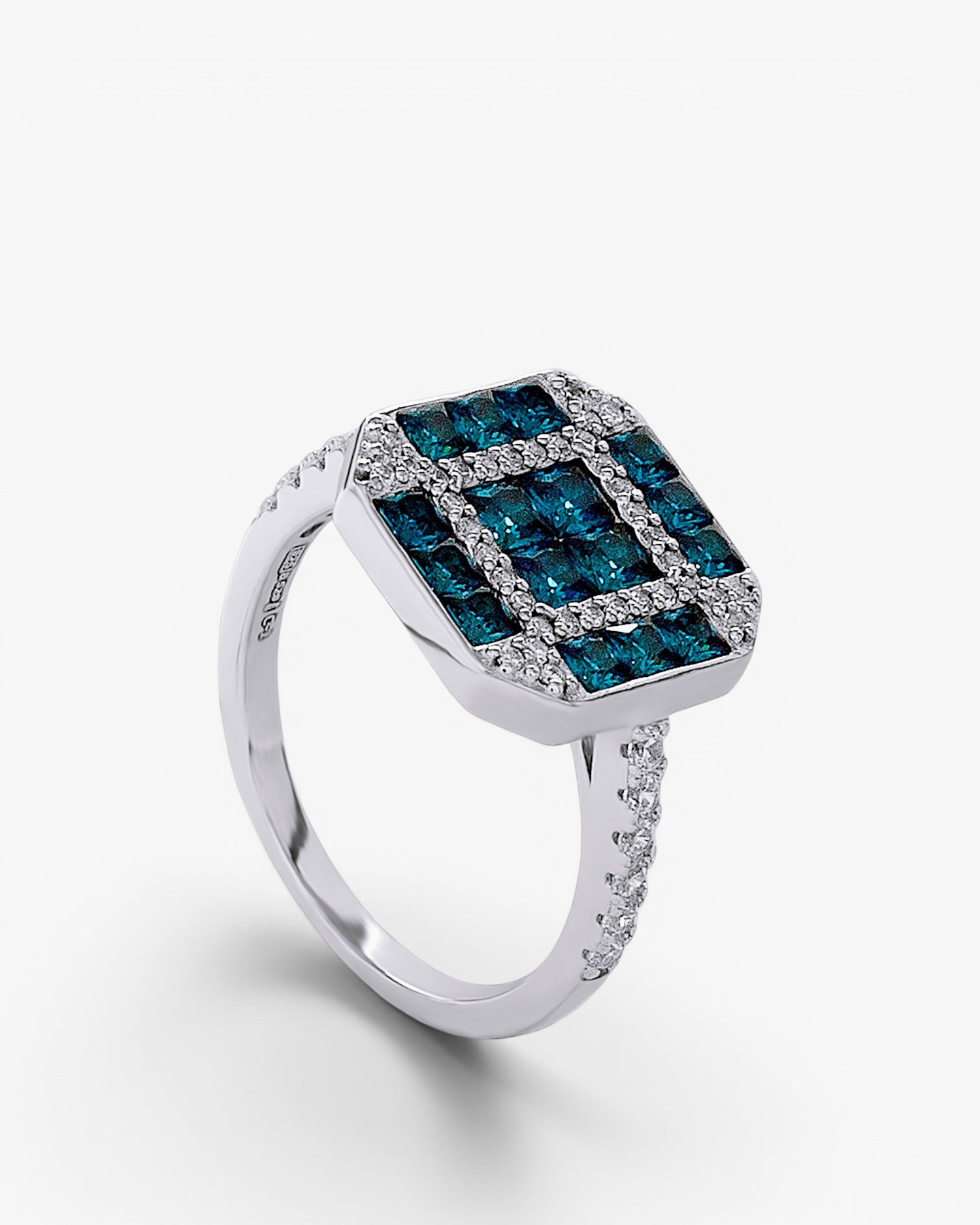 Anillo de plata con piedras azules y circonitas en aro fino