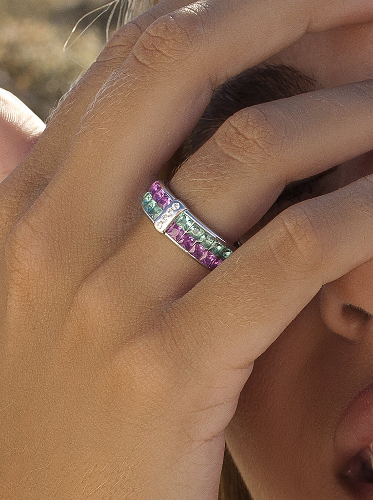 Silver ring with pink and green stones