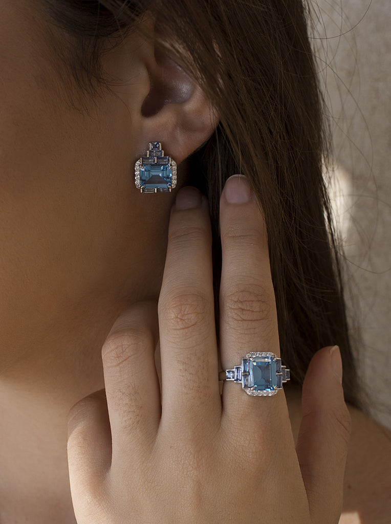 Pendientes de plata con piedras azules y detalles lila