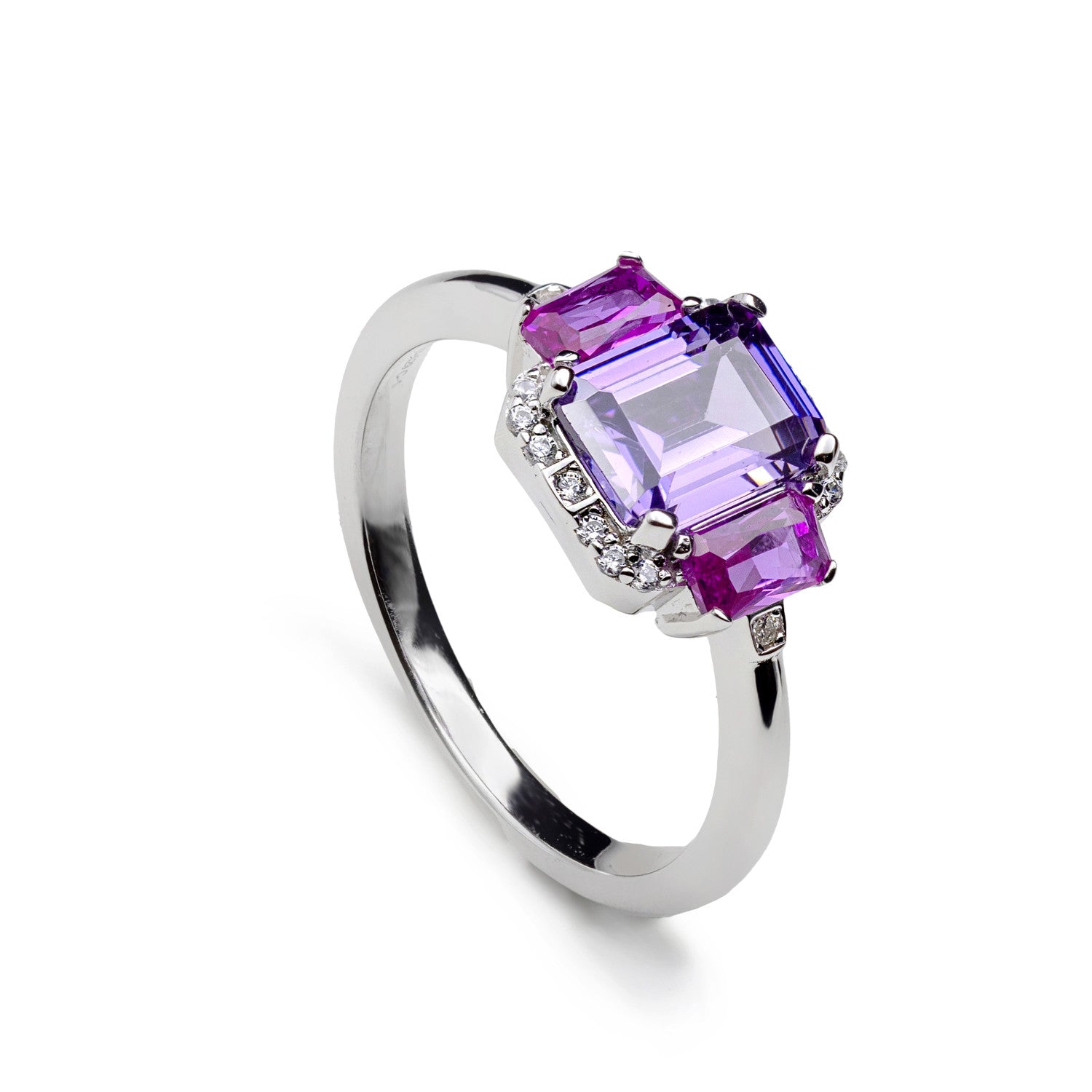 Anillo de plata con piedra lila y piedras fucsia