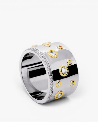 Anillo ancho de plata 925 bicolor con círculos dorados y circonitas