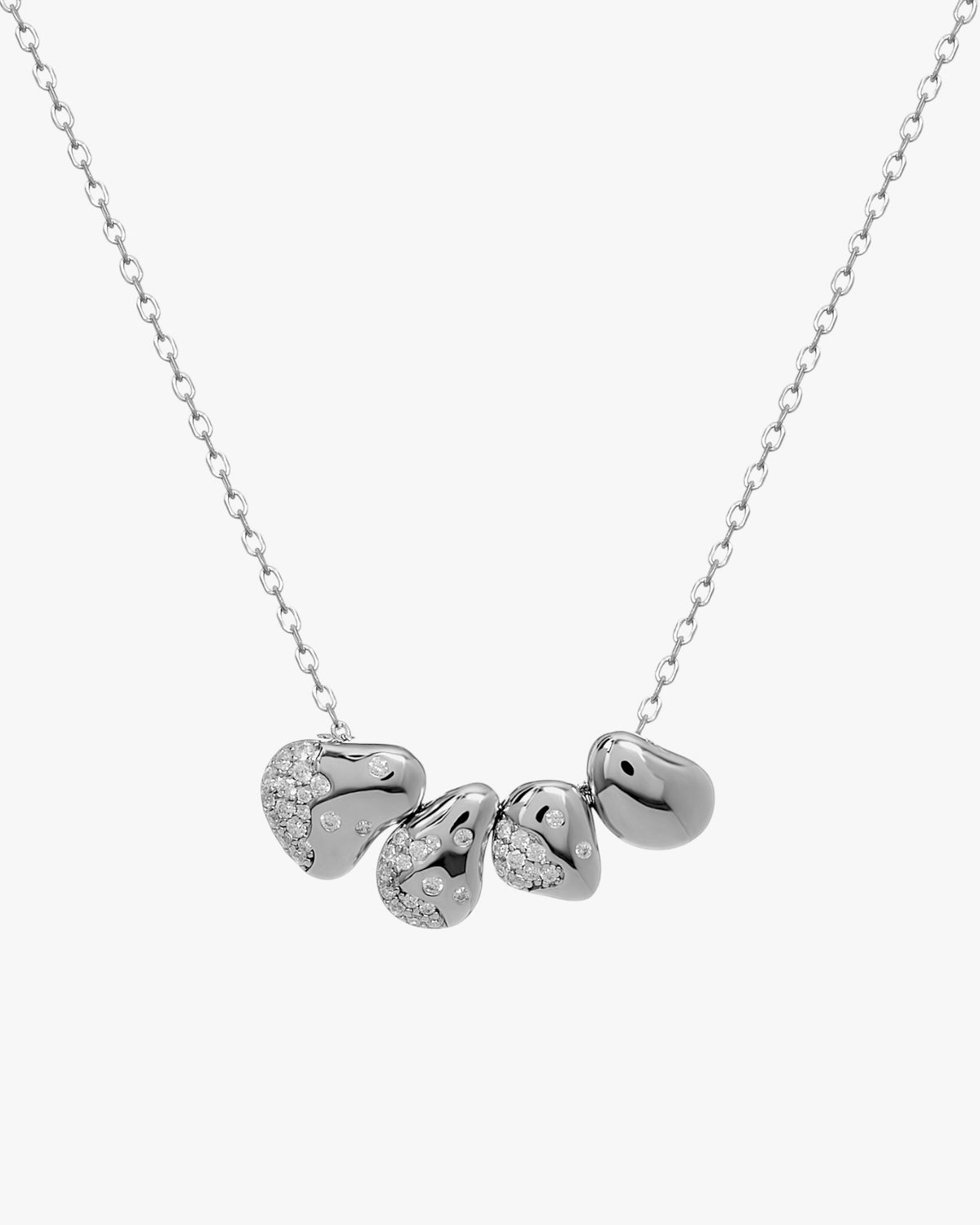 Collar de plata con piezas orgánicas y circonitas