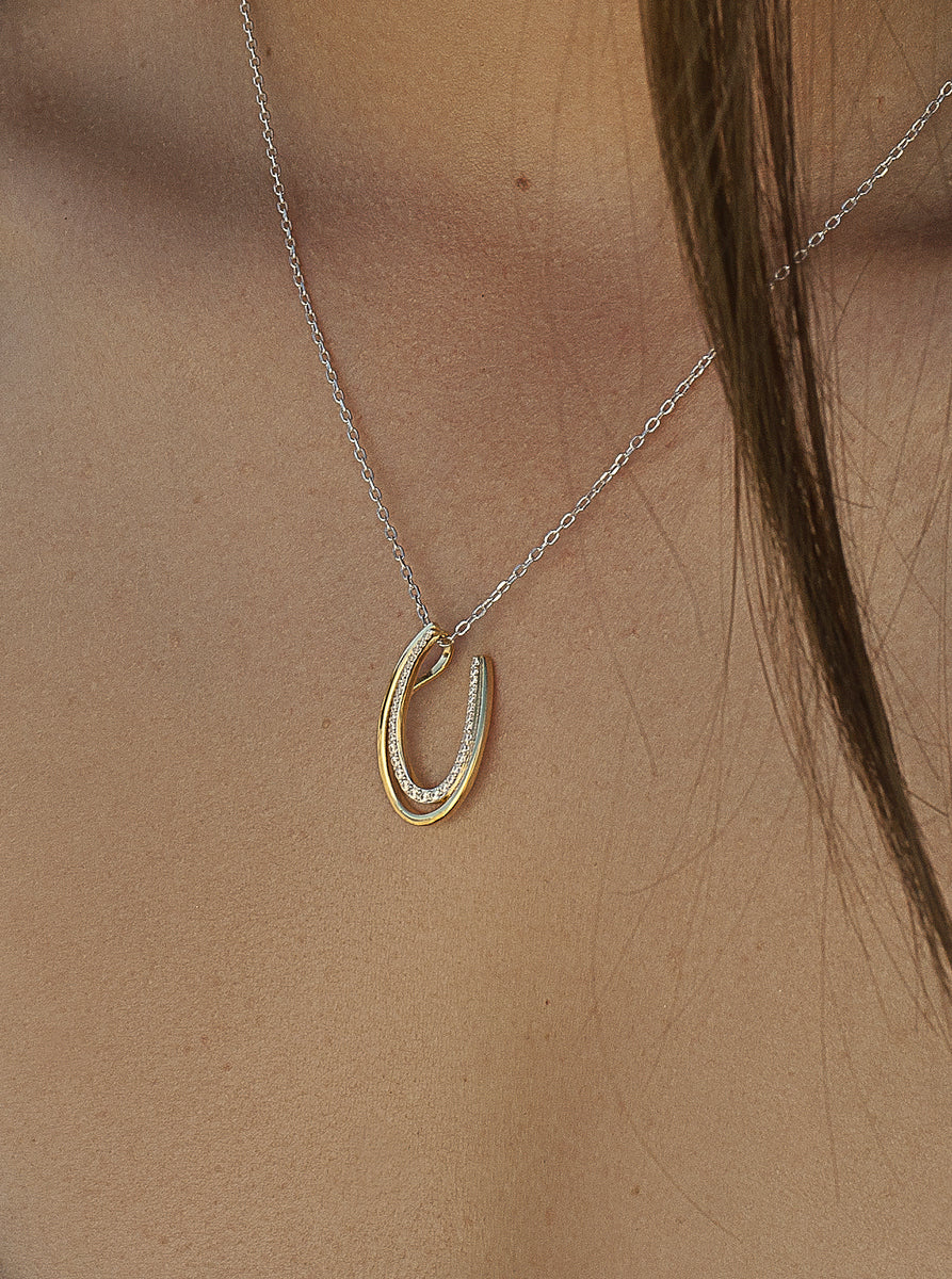 Collar bicolor de gota abierta con circonitas