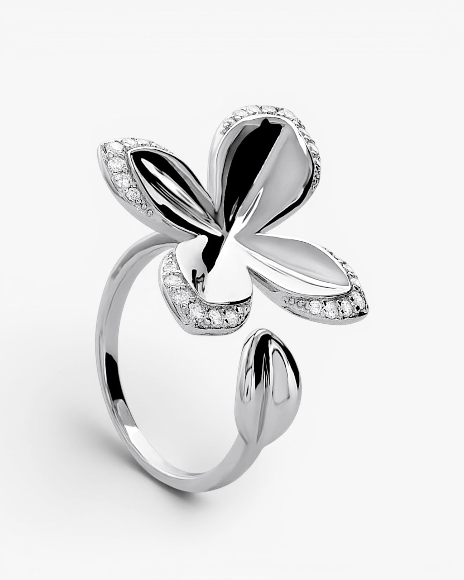 Anillo de plata abierto con flor y circonitas