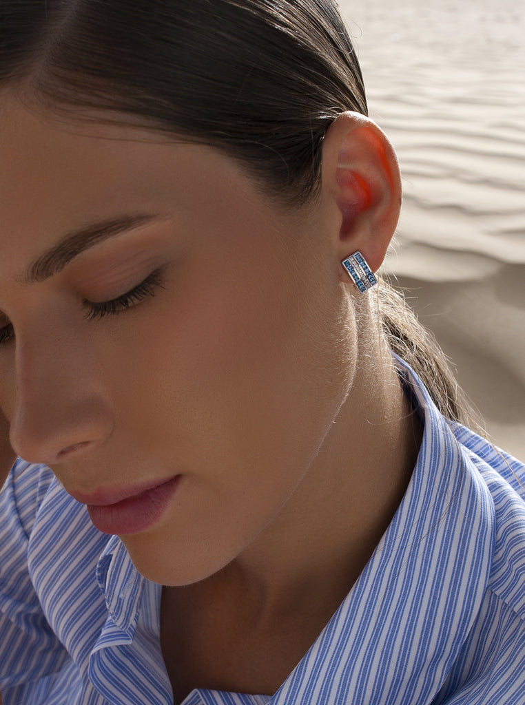 Silver earrings with linear blue cubic zirconia