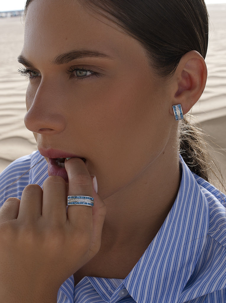 Silver earrings with linear blue cubic zirconia