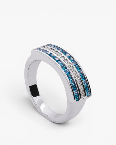 Wide silver ring with blue cubic zirconia