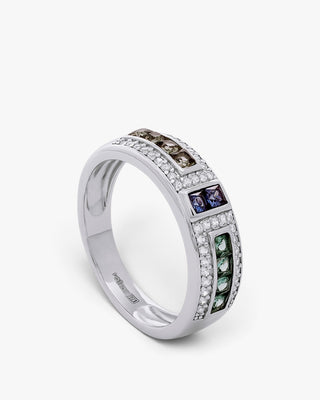 Silver ring with green, purple, and champagne stones