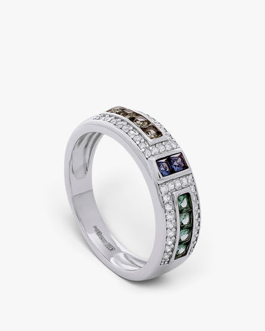 Silver ring with green, purple, and champagne stones