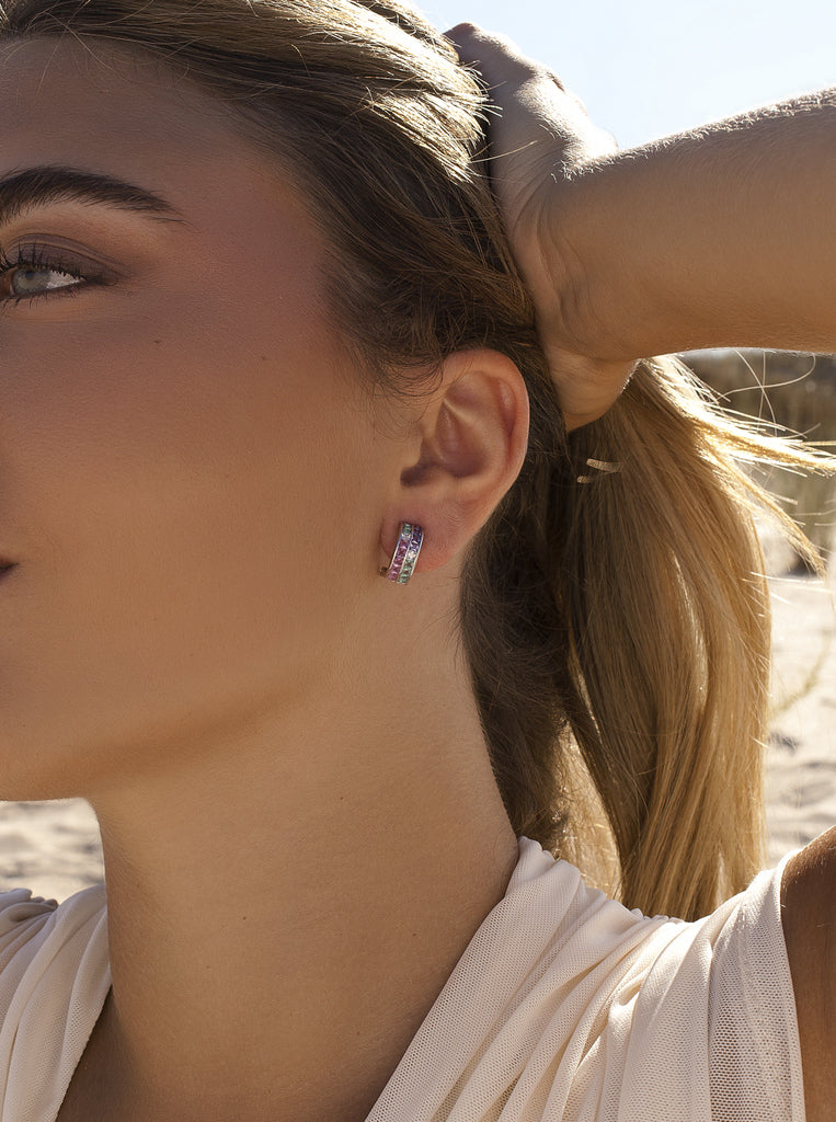 Silver earrings with green, pink, and lilac stones