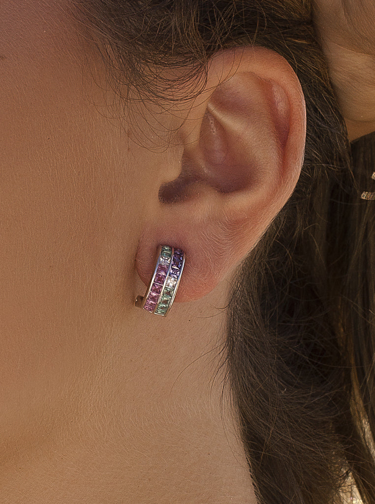 Silver earrings with green, pink, and lilac stones