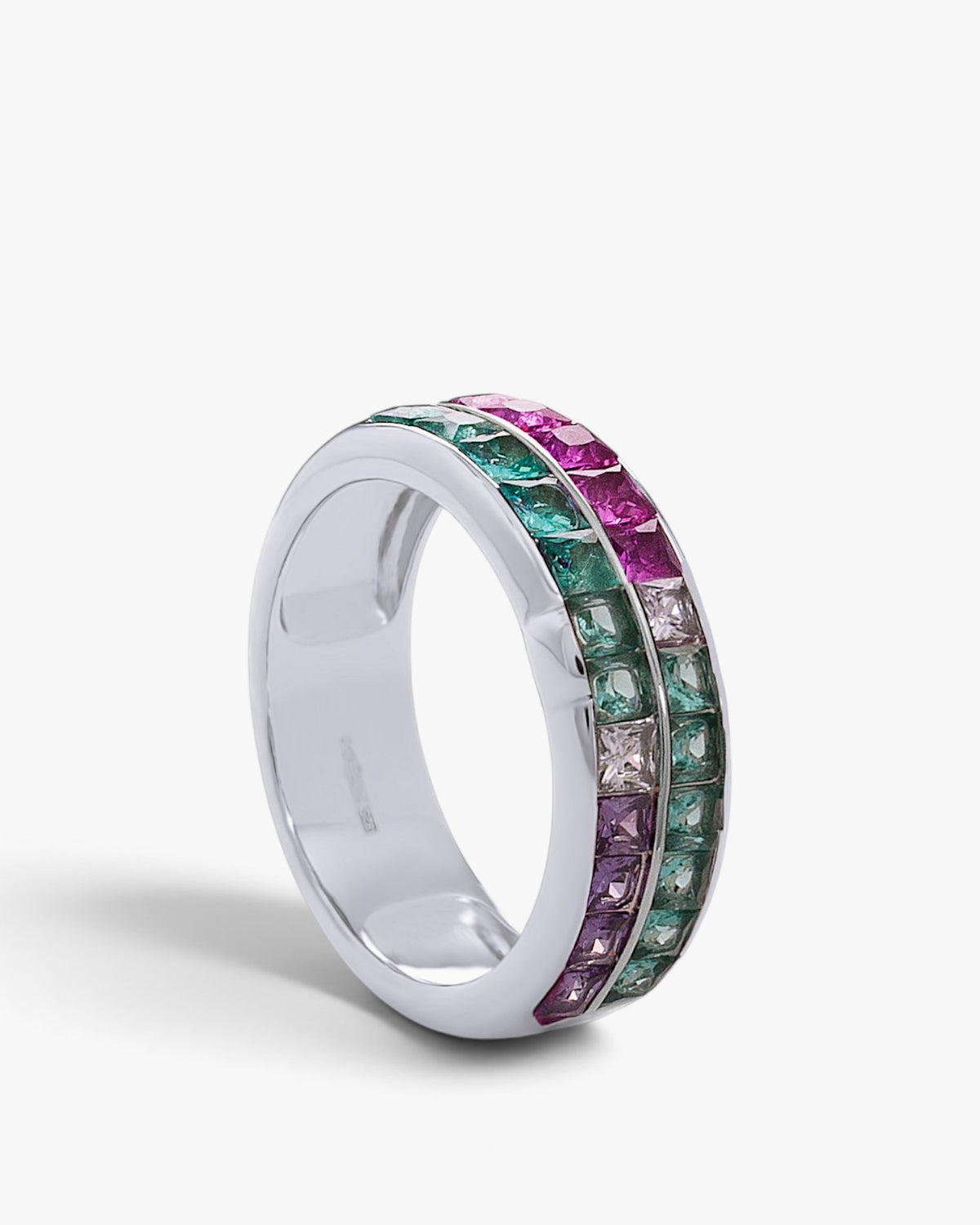 Silver ring with green, pink, and lilac stones