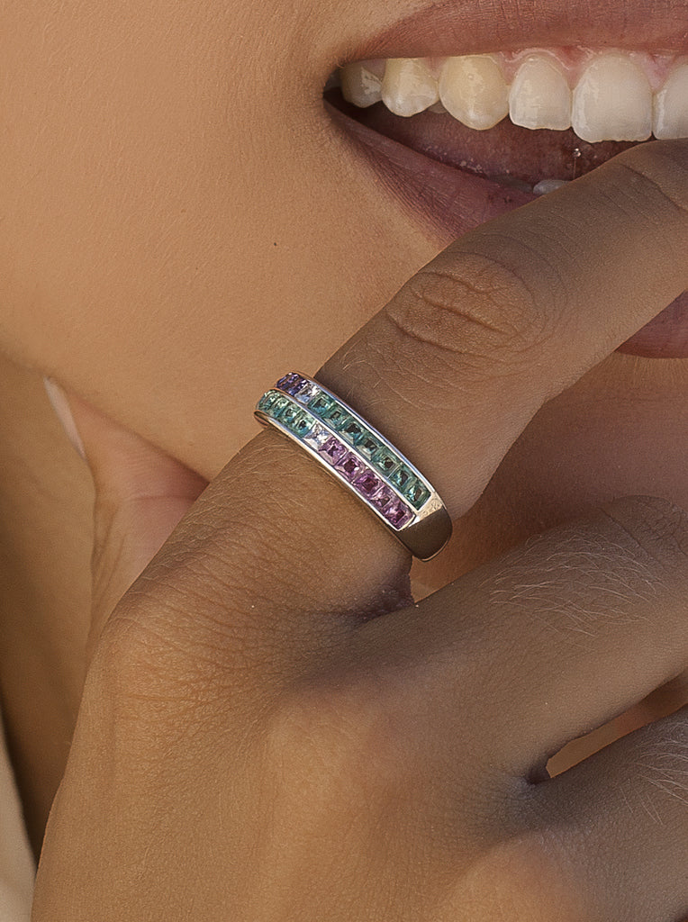 Silver ring with green, pink, and lilac stones