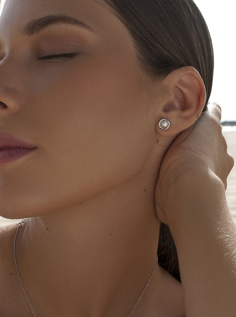 Pendientes de plata con perla y halo de circonitas