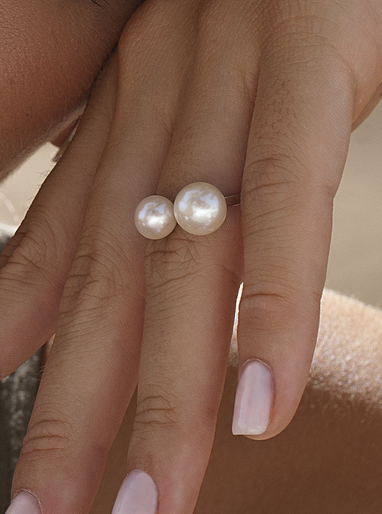 Open silver ring with two pearls