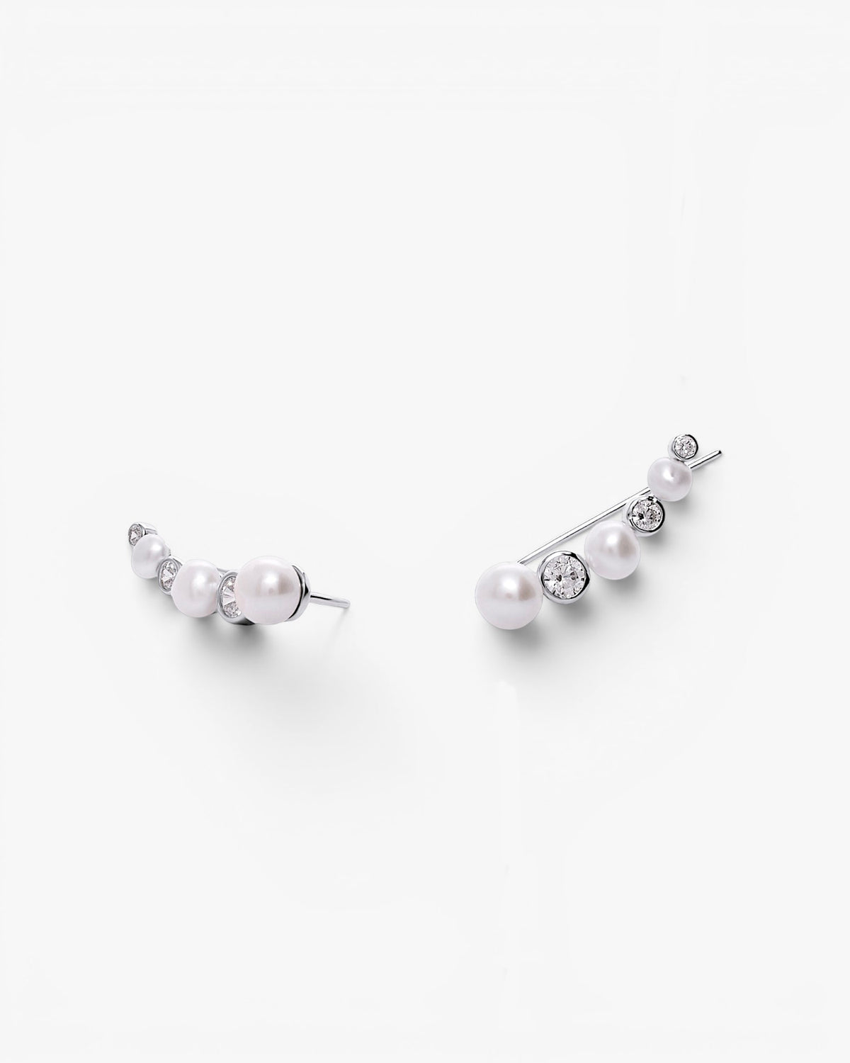 Silver climber earrings with pearls and cubic zirconia