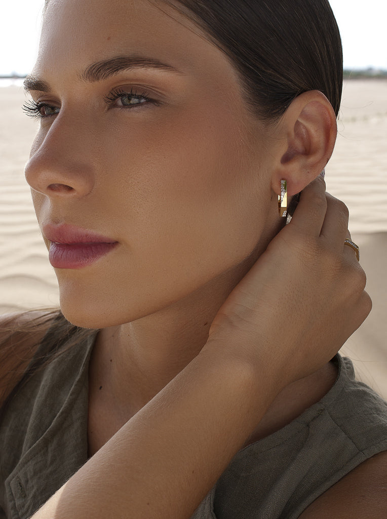 Gold geometric hoop earrings with zircons