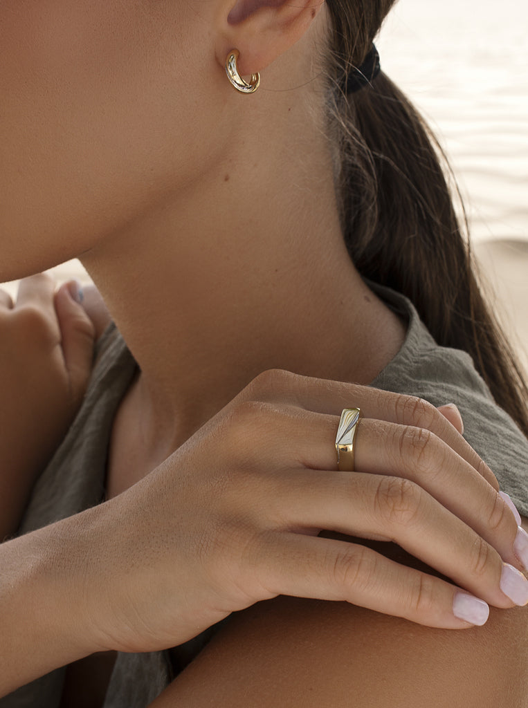 Wide bicolor gold and silver ring