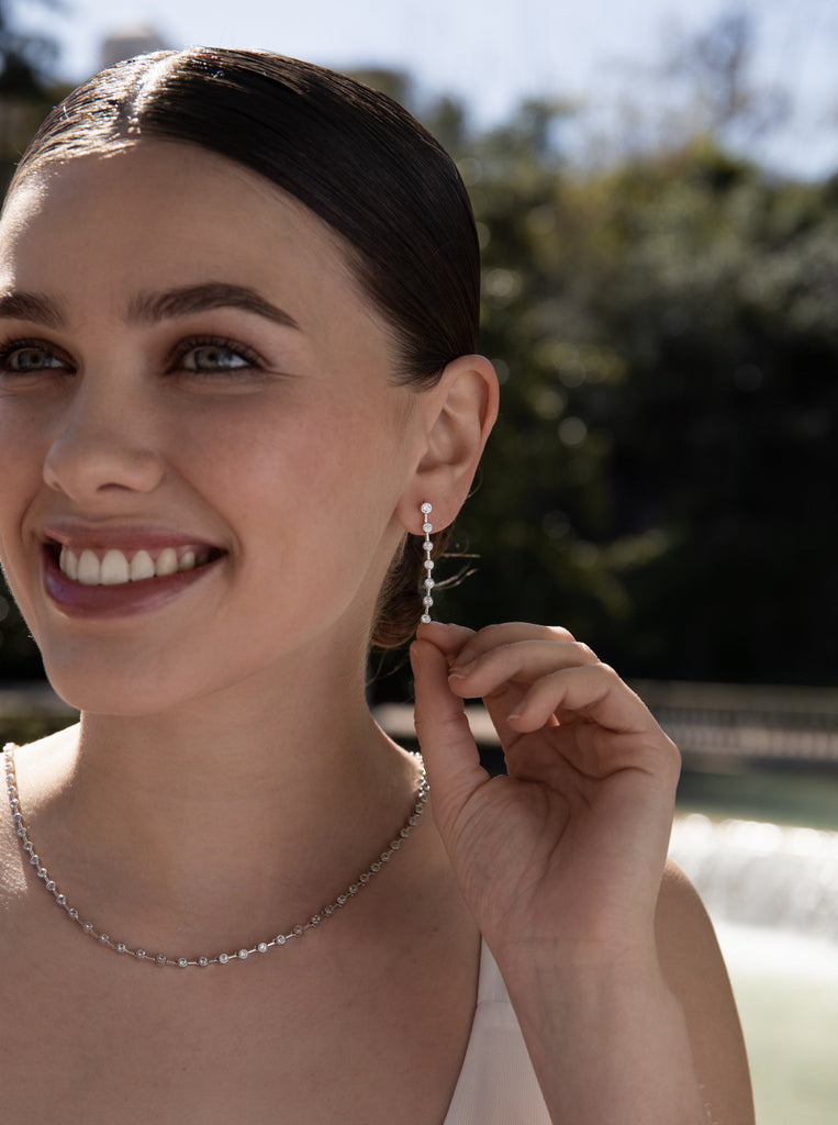 Pendientes largos finos de plata diseño lineal con circonitas