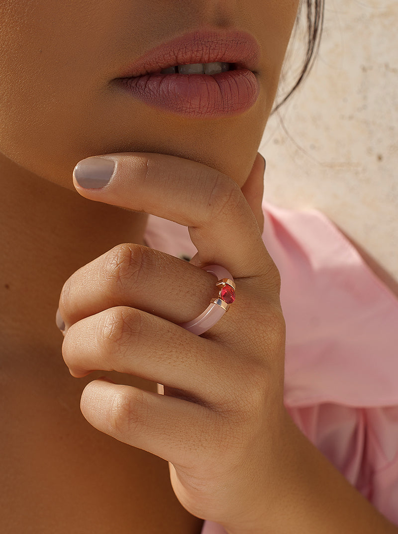 ring silver design with central fuchsia gemstone detail