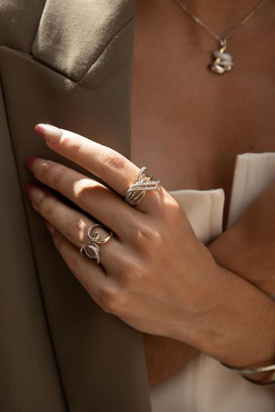 Anillos circonitas de plata múltiples raíles cruzados