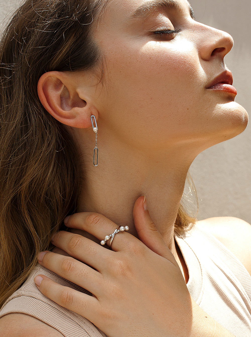 Anillos finos diseño cruzado con perlas y esferas