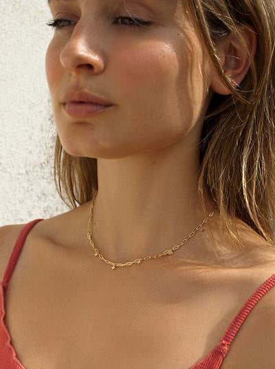 Colgante cadena de plata con circonitas colgantes dorado