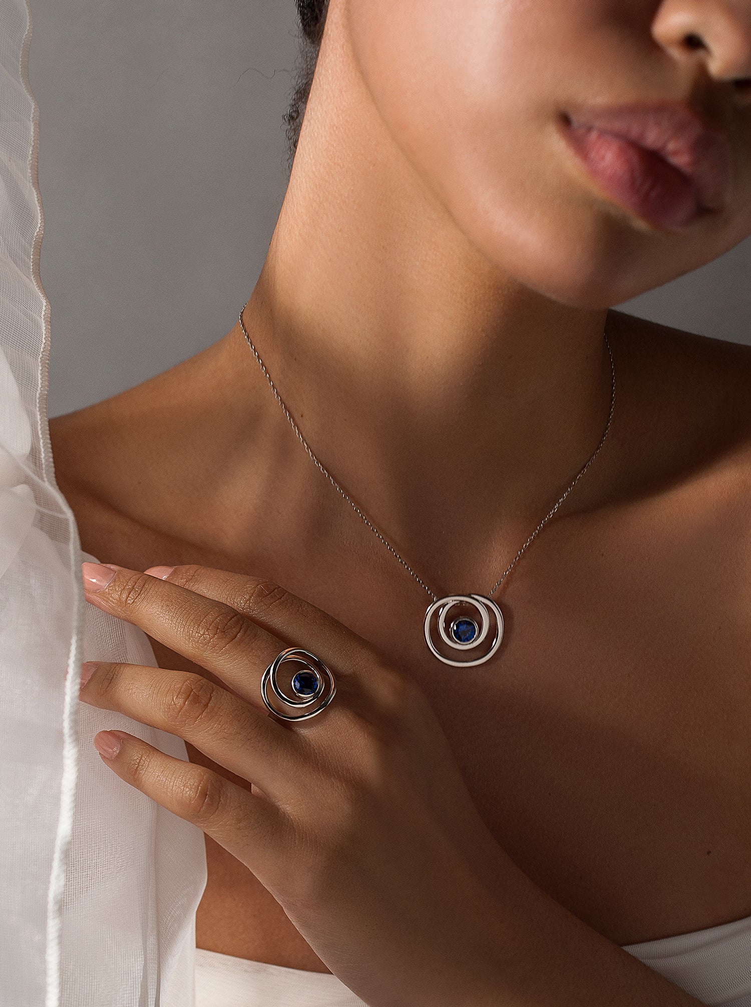 Silver pendants original spiral style with zirconia sapphire
