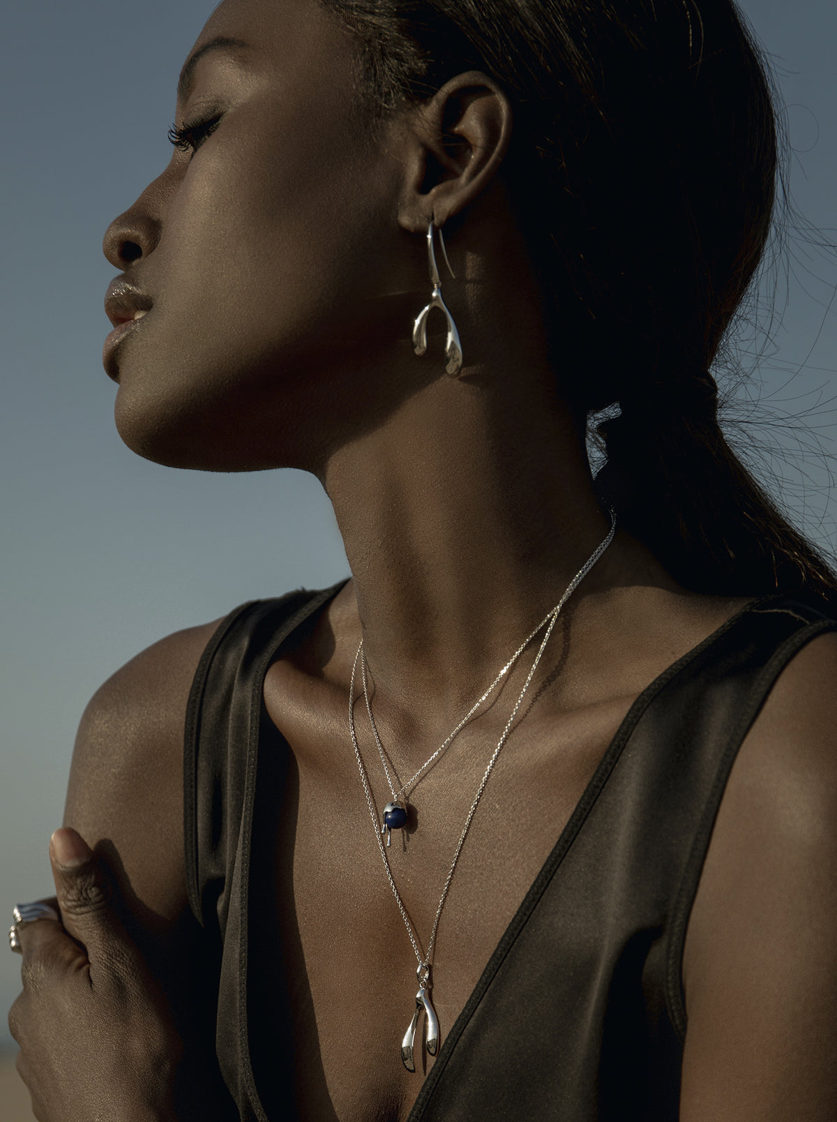 Original silver necklaces for women with a double teardrop design