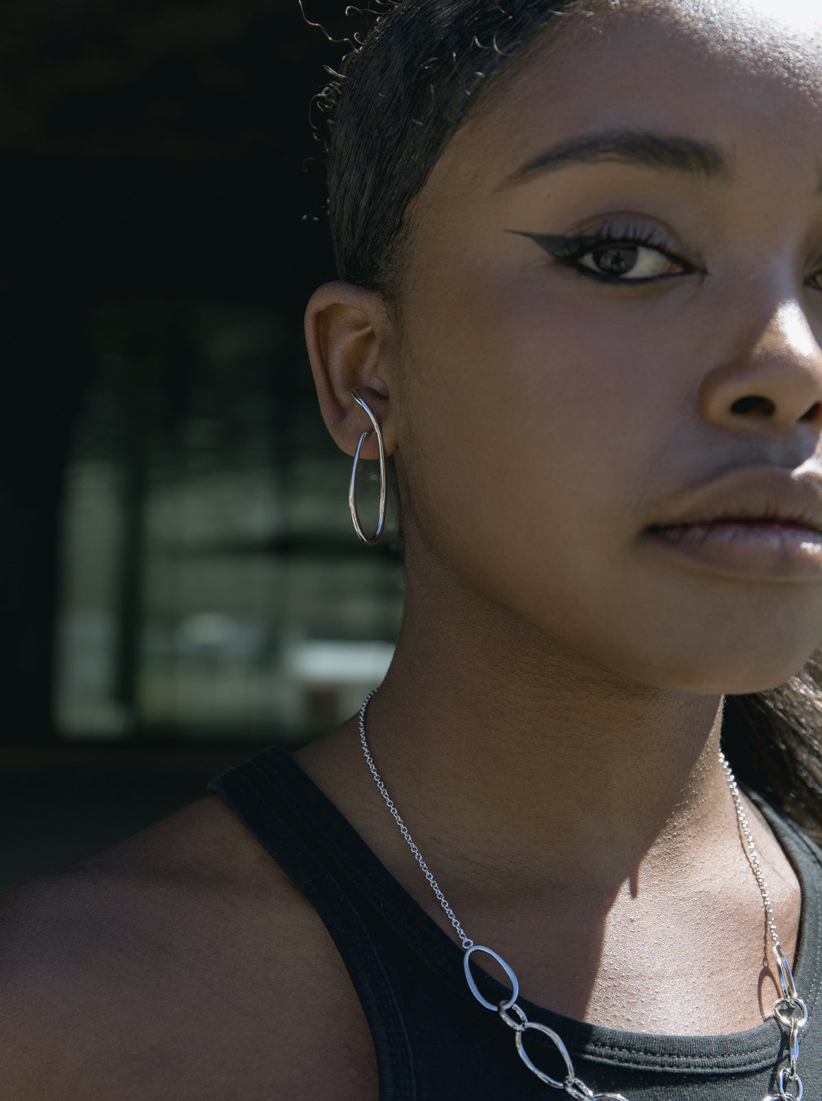 Original irregular earrings in plain silver