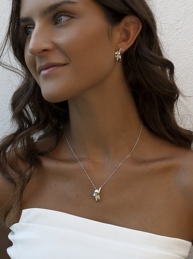 Boucles d'oreillesbicolore argent avec zircon de zircon design original