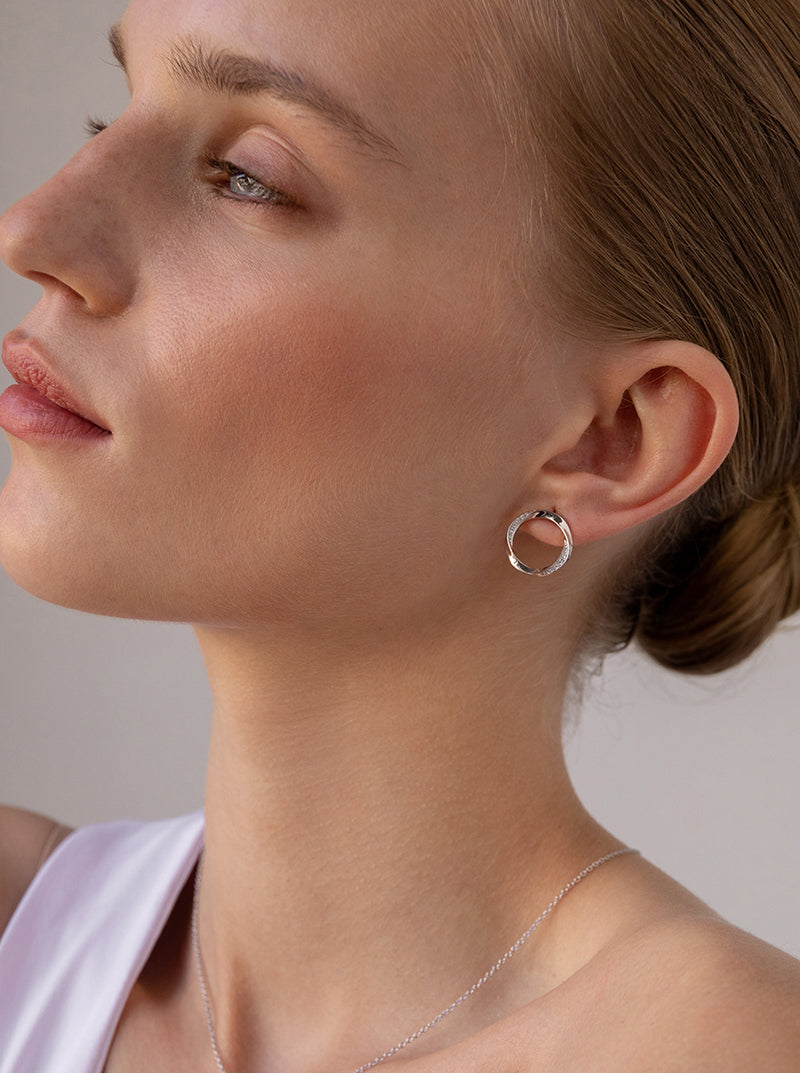 Pendientes aro diseño envolvente con circonitas