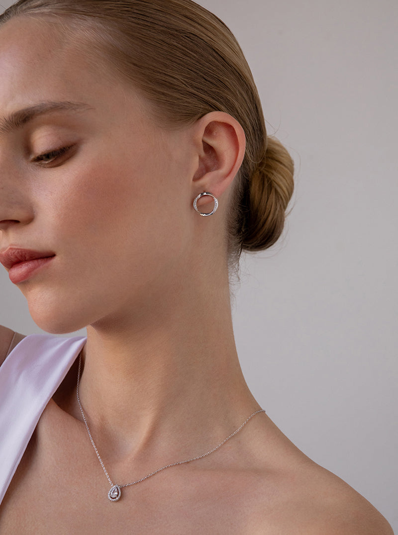 Pendientes aro diseño envolvente con circonitas