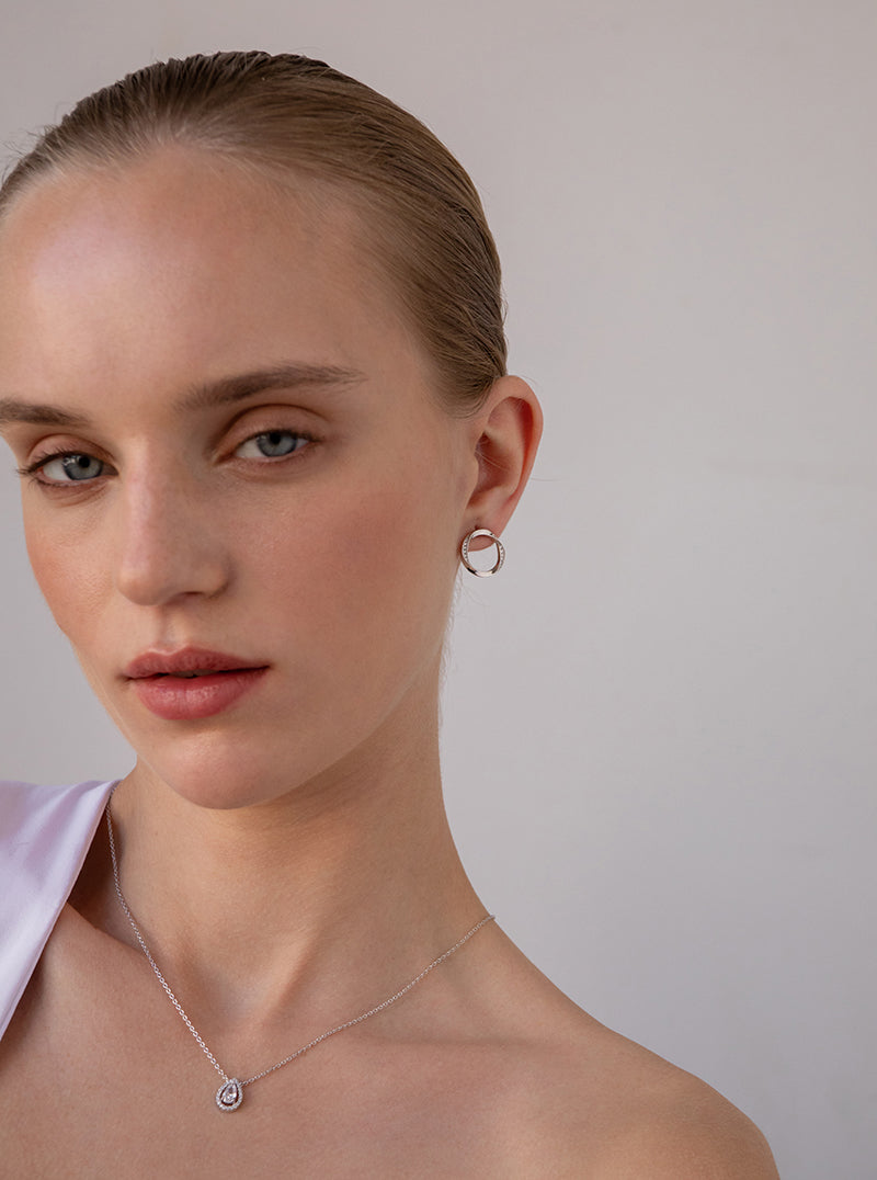 Pendientes aro diseño envolvente con circonitas