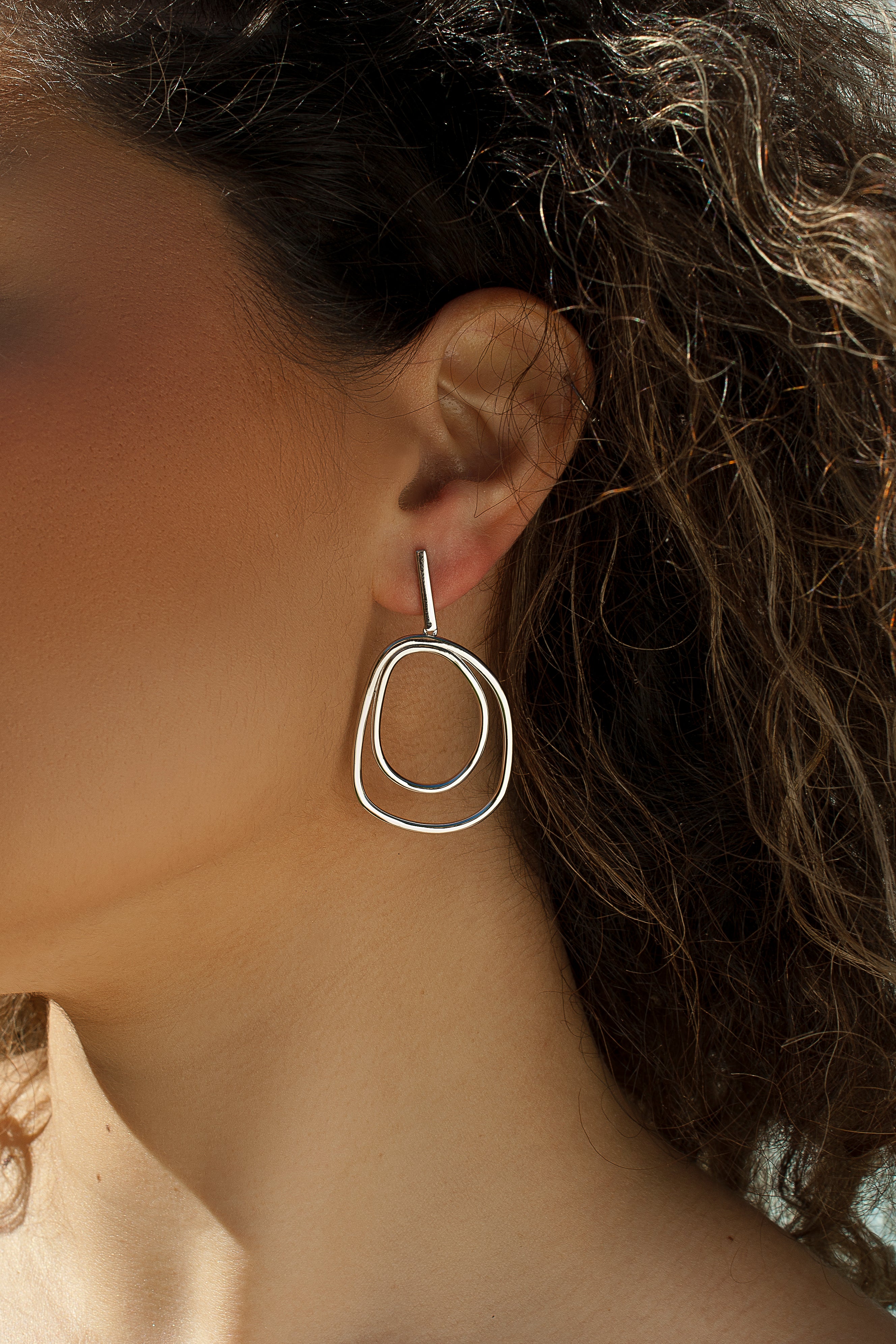 earrings hoops Large design irregular in smooth silver