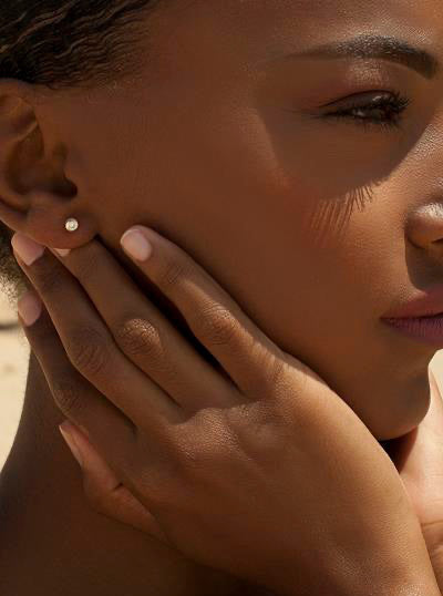 Pendientes botón diseño esmalte rosa palo combinado con plata y circonita