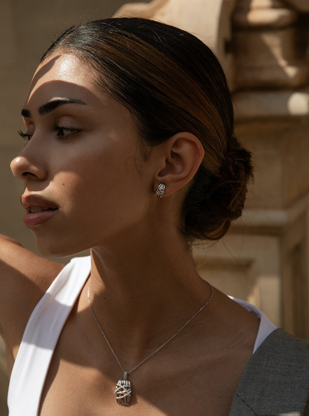 earrings clasp omega  zirconias interlocking detail