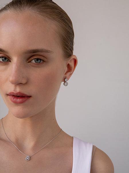 Boucles d'oreilles circulairesargent design double avec zirconsLINEARGENT