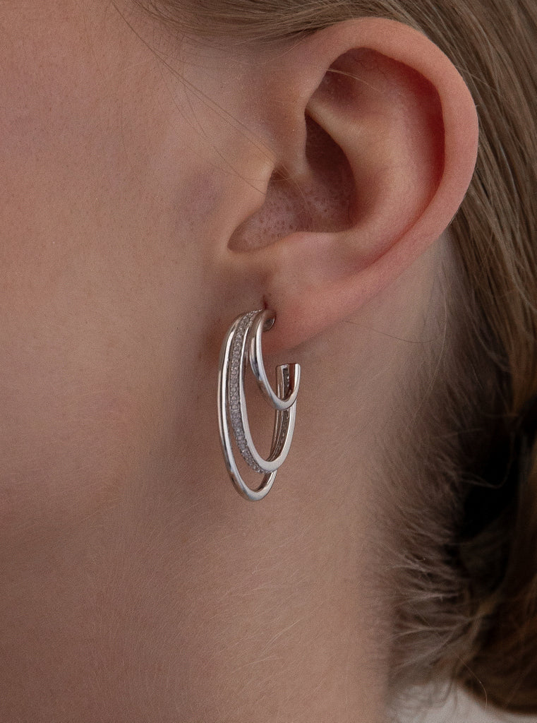 Boucles d'oreilles de  triplescréoles de différentes tailles avec zircon