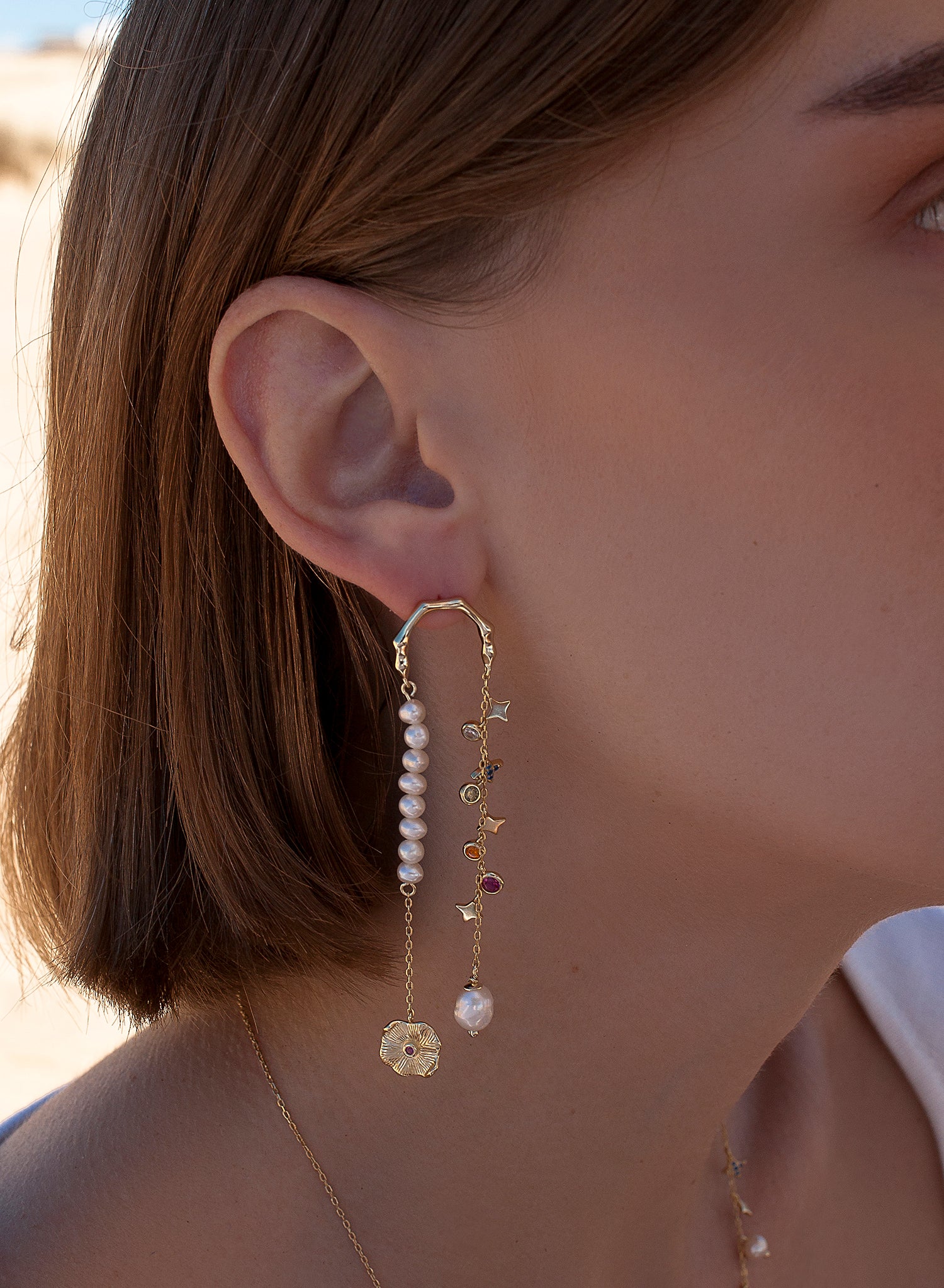 Pendientes largos de plata diseño doble colgante con baño de oro