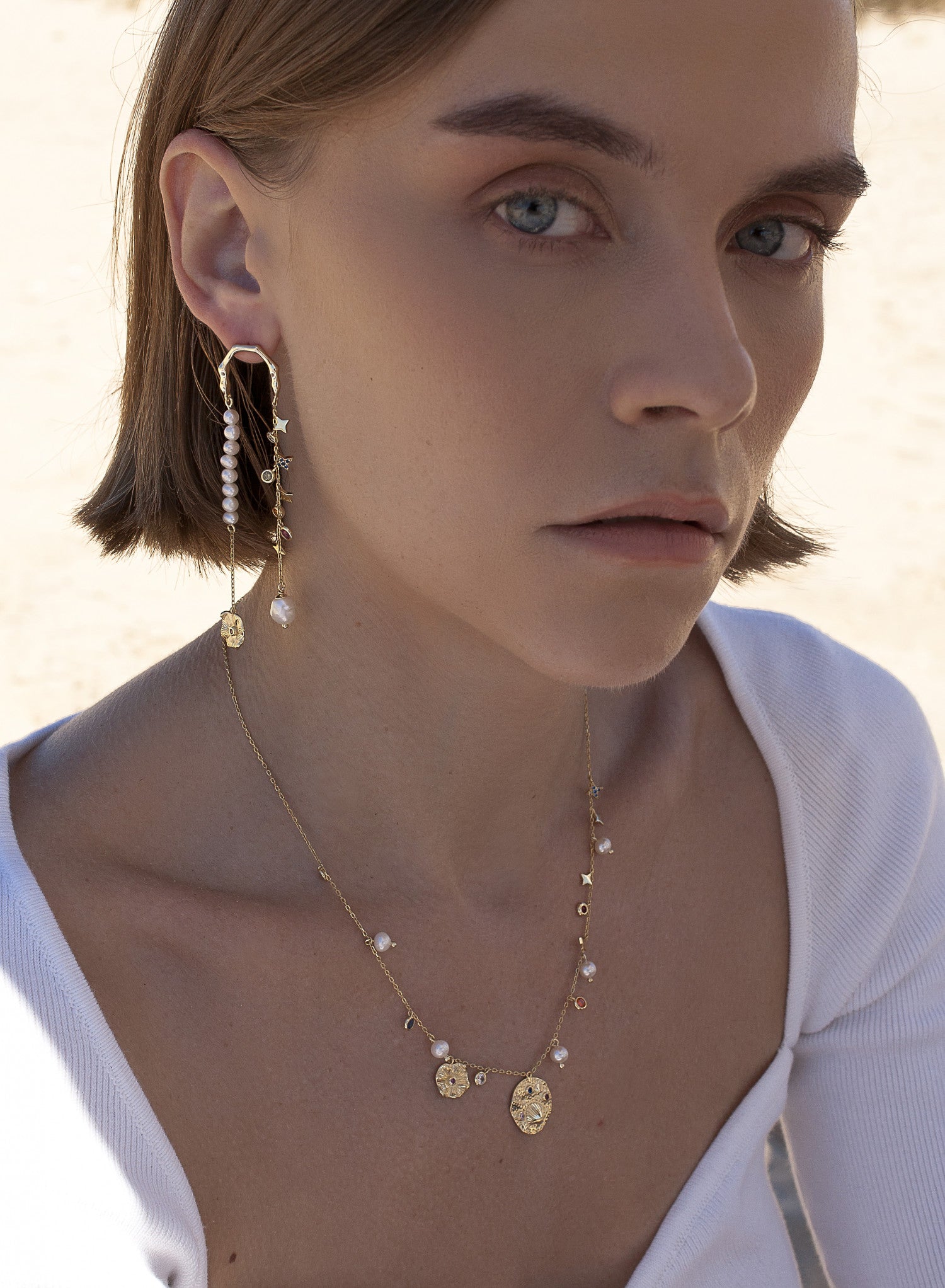 Pendientes largos de plata diseño doble colgante con baño de oro