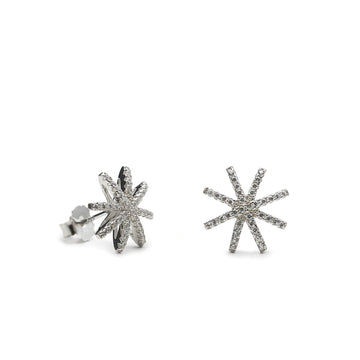 Pendientes tipo botón forma estrella con circonitas