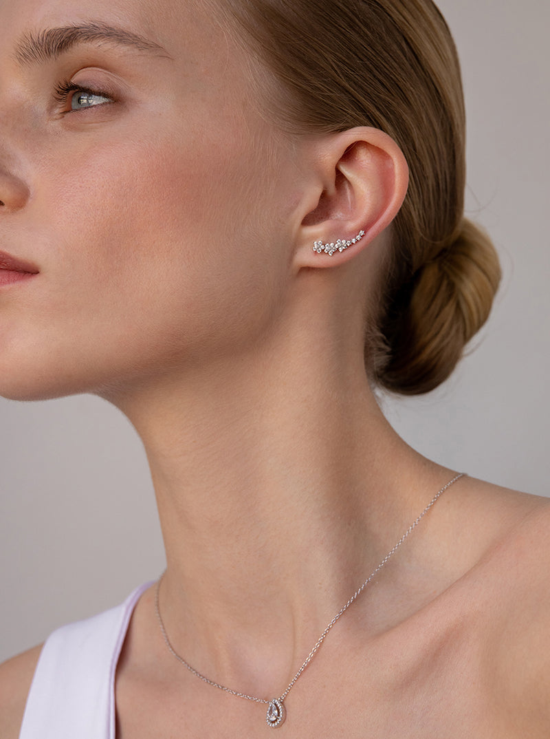 Boucles d'oreilles grimpeurs de argent avec motif de flor avec  zircons zirconsLINEARGENT