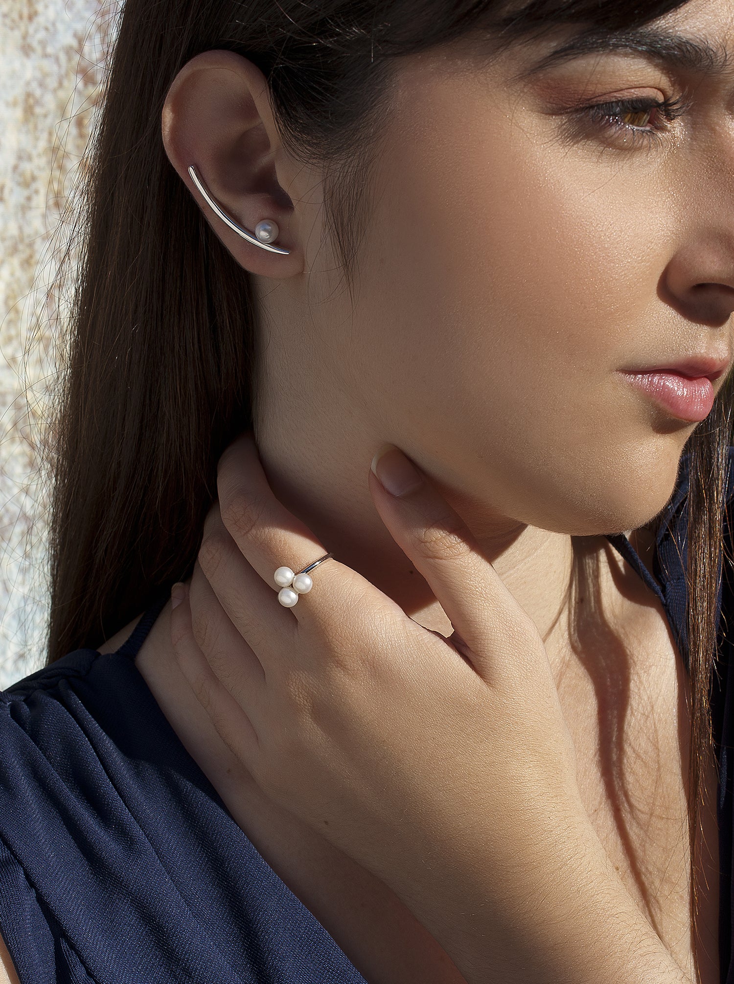 Pendientes trepadores de plata con una perla